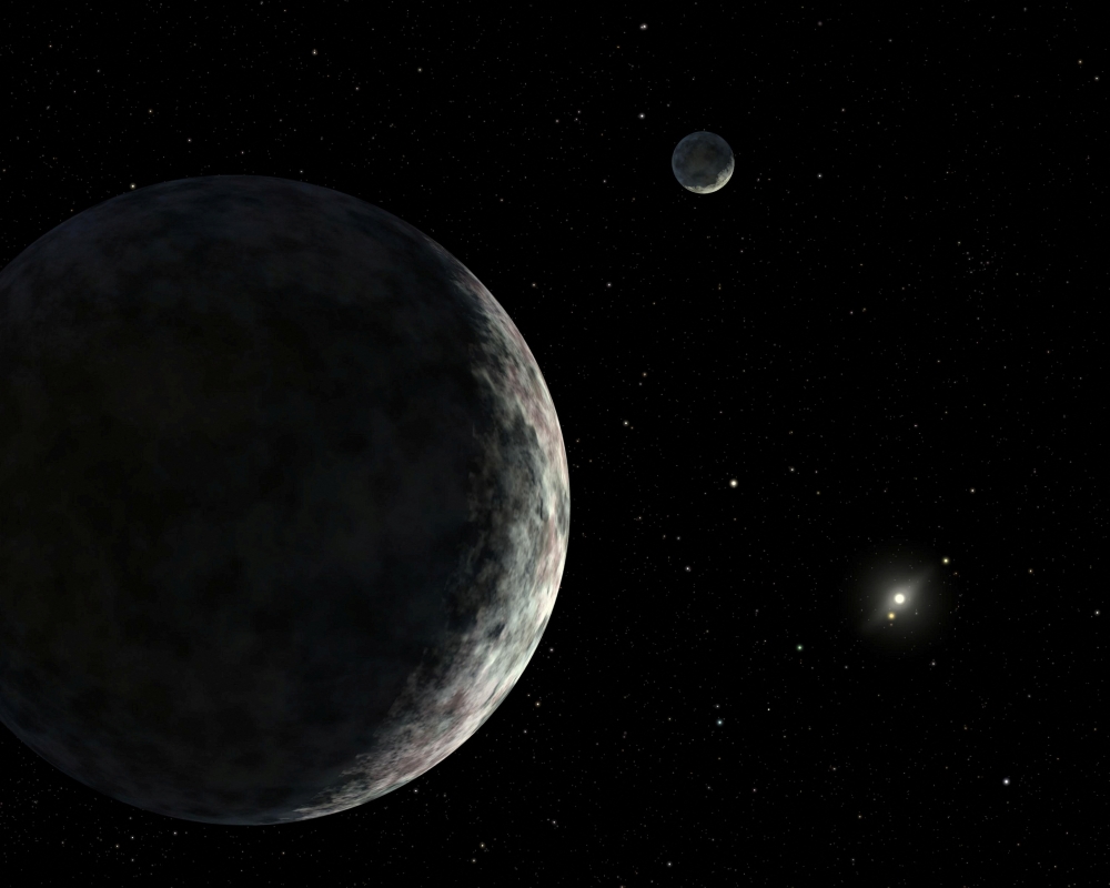 An artist's concept of the dwarf planet Eris and its moon Dysnomia is seen in this undated illustration released by Nasa. — Nasa/JPL-Caltech/Handout via Reuters pic