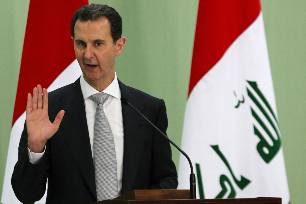 France has issued an international arrest warrant for Syrian President Bashar al-Assad accused of complicity in crimes against humanity and war crimes over chemical attacks in 2013, plaintiffs in the case said yesterday. — AFP pic