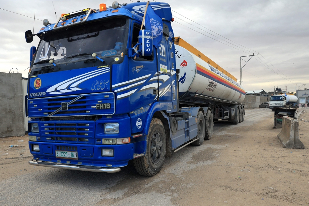 The first truck carrying fuel into Gaza since the start of Israel’s war with Hamas crossed from Egypt on Wednesday to deliver diesel to the United Nations, though it will do little to alleviate shortages that have hampered relief efforts. — AFP pic