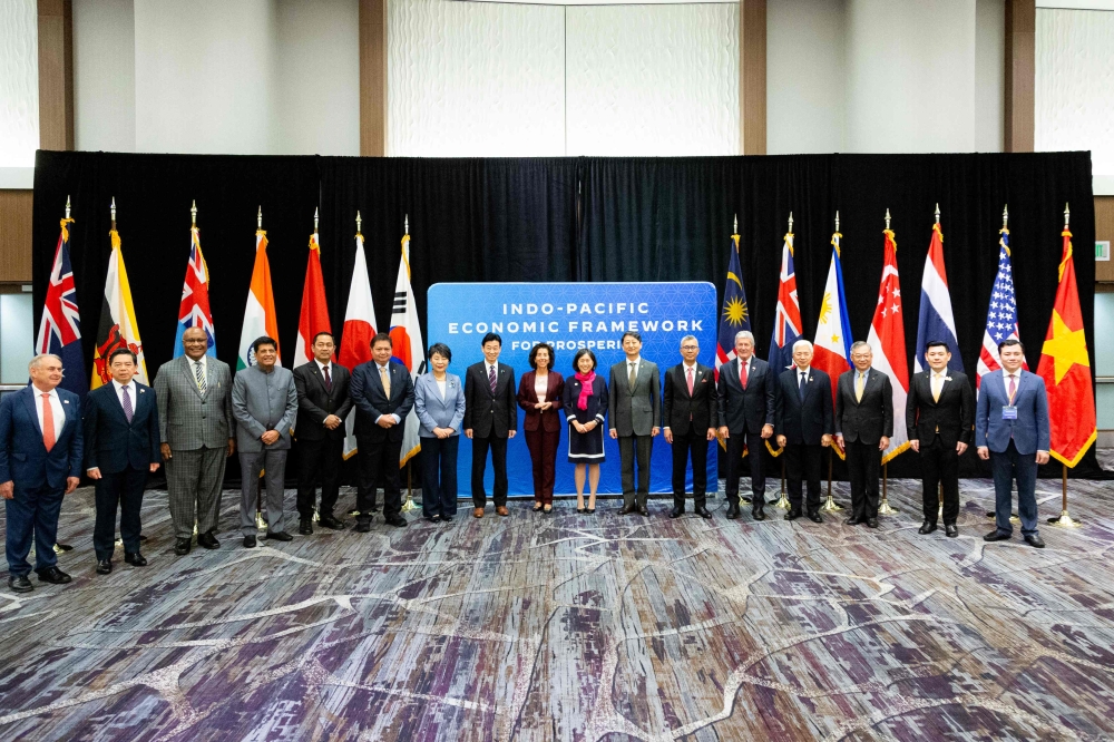 Trade ministers pose for a photo at the Indo-Pacific Economic Framework (IPEF) ministerial meeting at the Asia-Pacific Economic Cooperation (Apec) summit in San Francisco, on November 14, 2023. — AFP pic