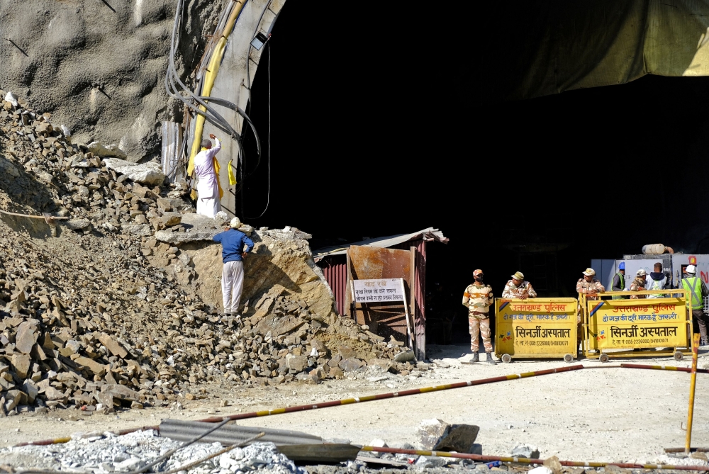 Forty men trapped inside a collapsed highway tunnel in the Indian Himalayas endured a fifth day confined to a small space in the rubble.  — Reuters pic