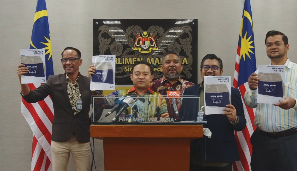 Tasek Gelugor MP Datuk Wan Saiful Wan Jan speaks during a press conference outside of the Dewan Rakyat. — Picture by Muhammad Yusry