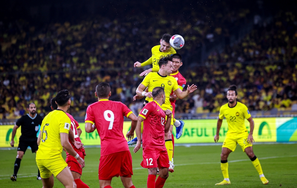 Dion Cools in action as he heads the ball in the opening Group D match of the 2026 World Cup/2027 Asian Cup Qualifiers at the Bukit Jalil National Stadium, November 16, 2023. — Bernama pic 