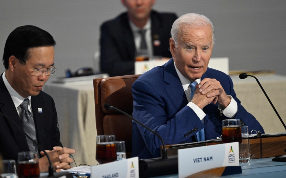 Vietnamese President Vo Van Thuong (left) listens as US President Joe Biden speaks during a roundtable meeting with World leaders attending the Asia-Pacific Economic Cooperation (Apec) Leaders' Week in San Francisco, California November 16, 2023. — AFP pic