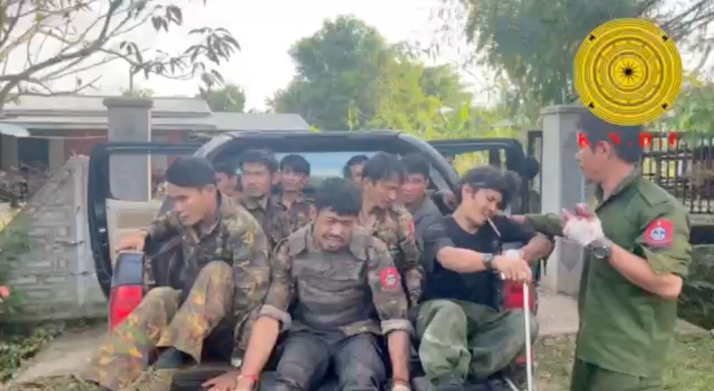 Myanmar military soldiers who have surrendered to the Karenni Nationalities Defense Force ride in the back of a vehicle in Loikaw, Myanmar, in this still image taken from video released November 15, 2023. — Picture by Karenni Nationalities Defence Force/Handout via Reuters