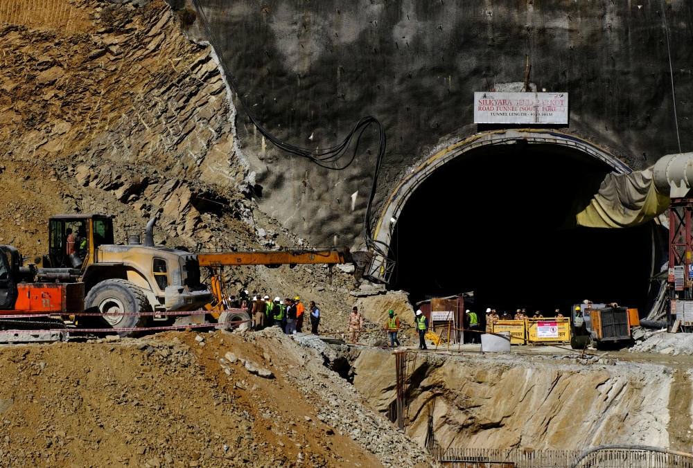 Indian rescuers said today they had drilled less than halfway through the debris to reach 40 men trapped in a collapsed tunnel for nearly a week. — Reuters pic