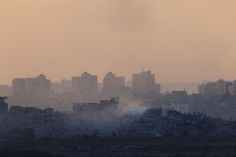 Buildings lie in ruin in Gaza, amid the ongoing conflict between Israel and the Palestinian group Hamas, as seen from south Israel November 17, 2023. ― Reuters pic