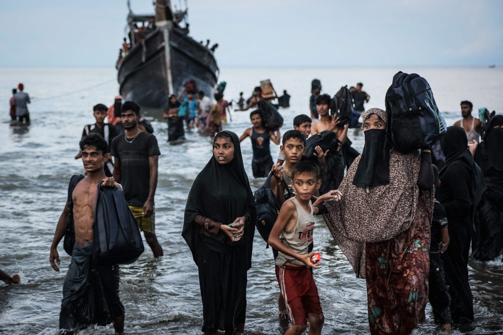 Three boats filled with more than 500 Rohingya refugees landed in Indonesia’s westernmost province on today, a UN agency said, in one of the biggest arrivals since Myanmar launched a military crackdown on the minority group in 2017. — AFP pic