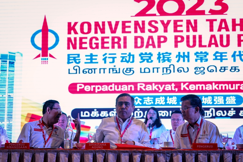 (From left) DAP chairman Lim Guan Eng, secretary-general Anthony Loke and Penang state chairman Chow Kon Yeow are seen at the Penang DAP 2023 annual convention in George Town November 19, 2023. — Bernama pic