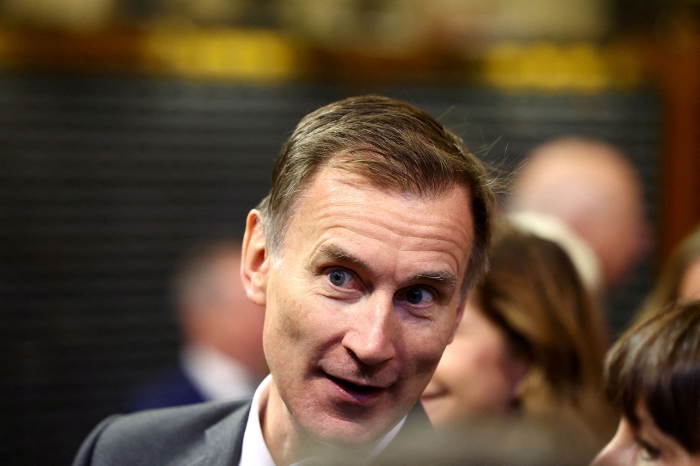 When asked if he would cut inheritance tax - a move the Sunday Times said could be delayed owing to bad press Jeremy Hunt said 'everything is on the table' ahead of his statement. — Reuters pic