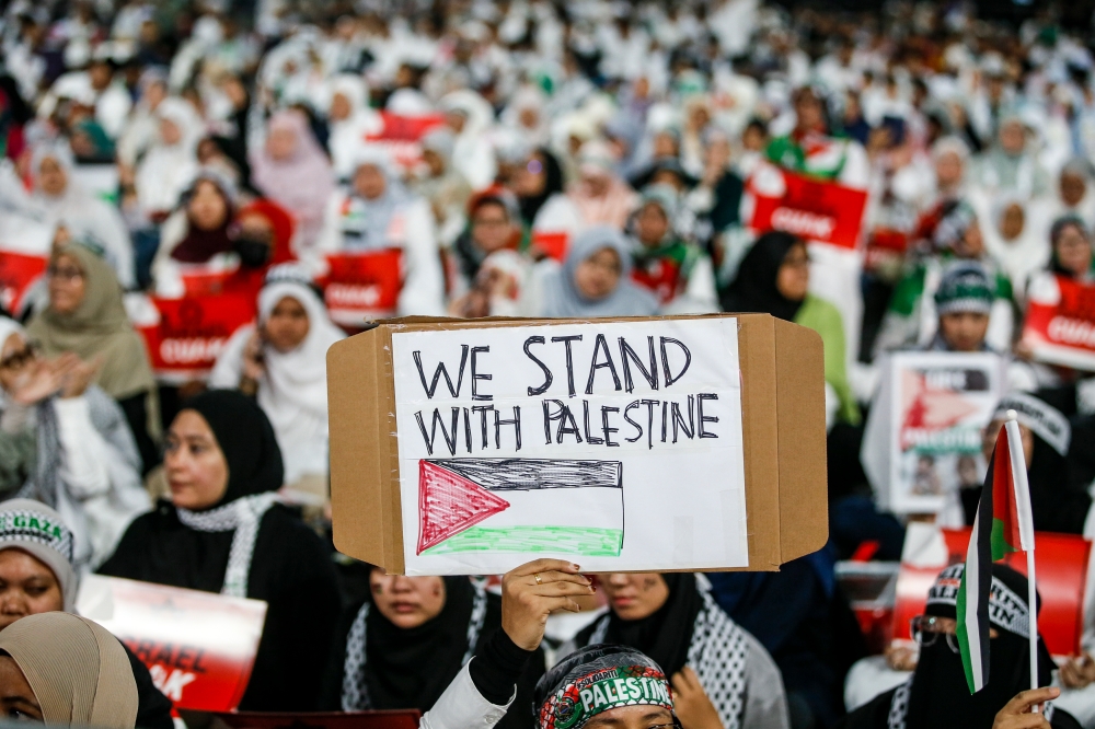 People attend a Solidarity with Palestine rally in the wake of the conflict between Israel and Hamas in the Gaza at Axiata Arena, Bukit Jalil in this file photo taken on October 24, 2023. Over 5,000 Muslims thronged Sultan Iskandar Mosque at Bandar Dato’ Onn here to attend a Palestinian solidarity gathering this evening. — Picture by Hari Anggara.