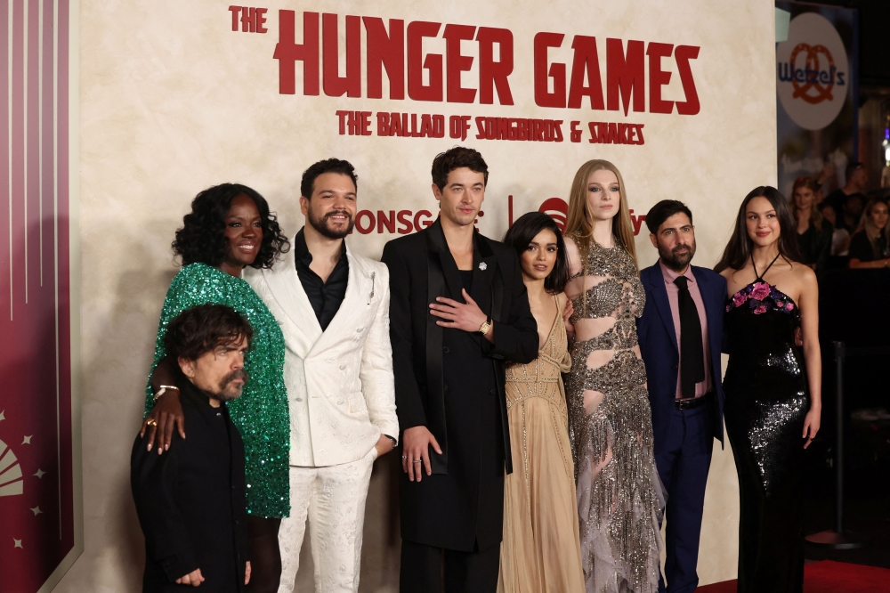 The cast of ‘Hunger Games’ attends the premiere of the film in Los Angeles. — Reuters pic