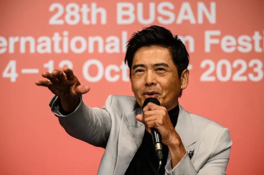 Chow Yun-fat completes his first half-marathon in two hours 27 minutes. — AFP pic
