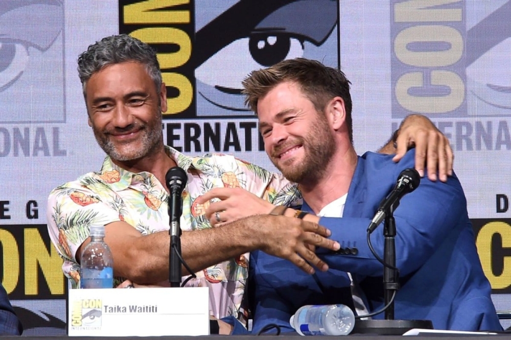 Director Taika Waititi (left) hinted that Chris Hemsworth is in discussions with Marvel on making ‘Thor 5’. — AFP pic