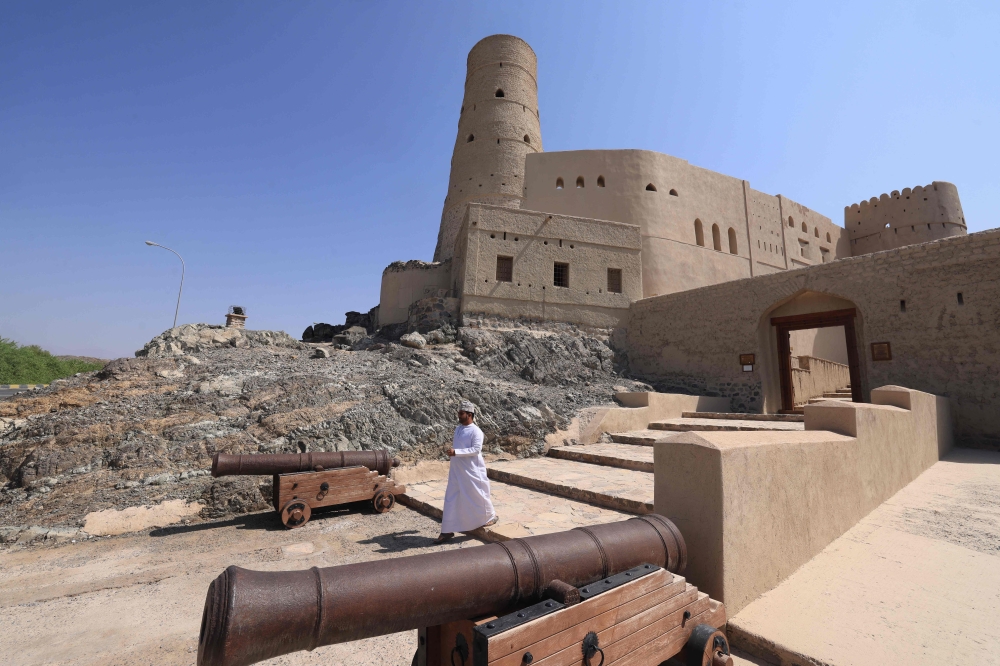 A picture shows a view of Bahla Fort, one of four historical forts located at the foot of the Green Mountain highlands of Oman, and the only fort in the country designated a Unesco Heritage Site, in Bahla, 200km north of Muscat, on October 5, 2023. — AFP pic