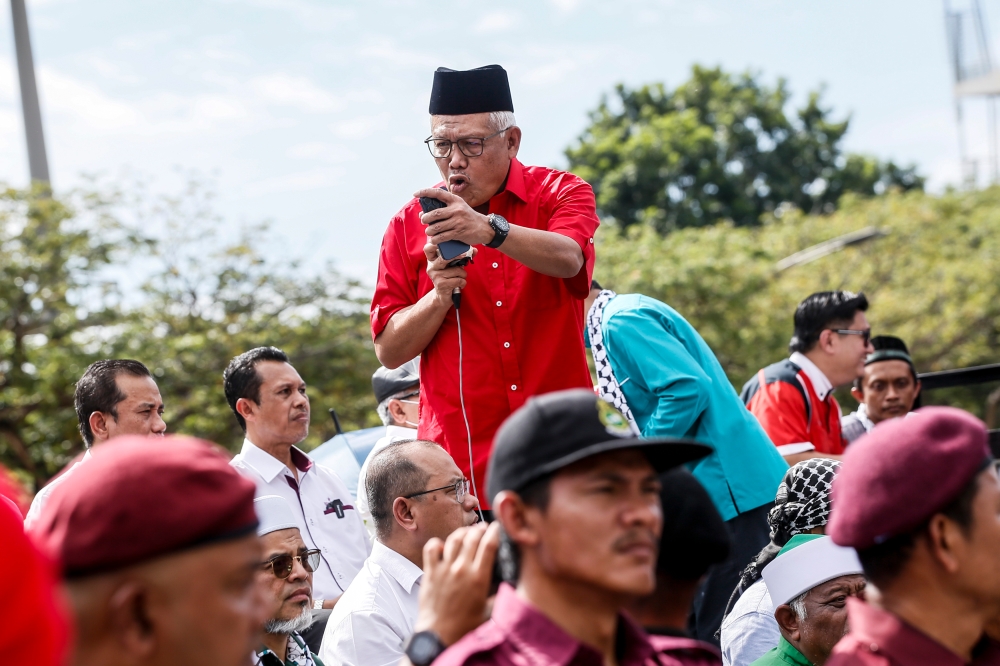 Opposition Leader Datuk Seri Hamzah Zainudin deliver his speech during the protest outside the Court of Palace in Putrajaya November 20, 2023. — Picture by Hari Anggara