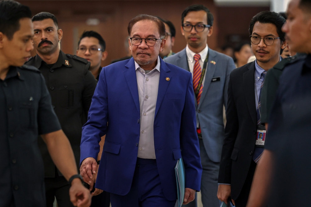 Prime Minister Datuk Seri Anwar Ibrahim arrives at the Parliament building in Kuala Lumpur November 21, 2023. — Bernama pic