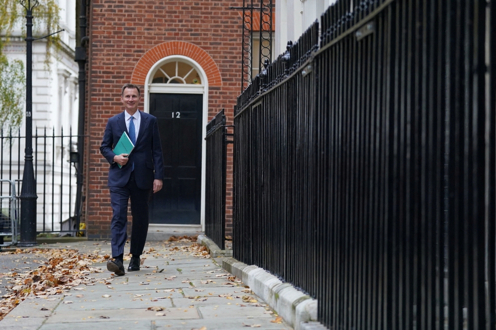 Chancellor of the Exchequer Jeremy Hunt leaves 11 Downing Street for the House of Commons to deliver his autumn statement, in London, Britain, November 22, 2023. — Stefan Rousseau/Pool/Reuters pic