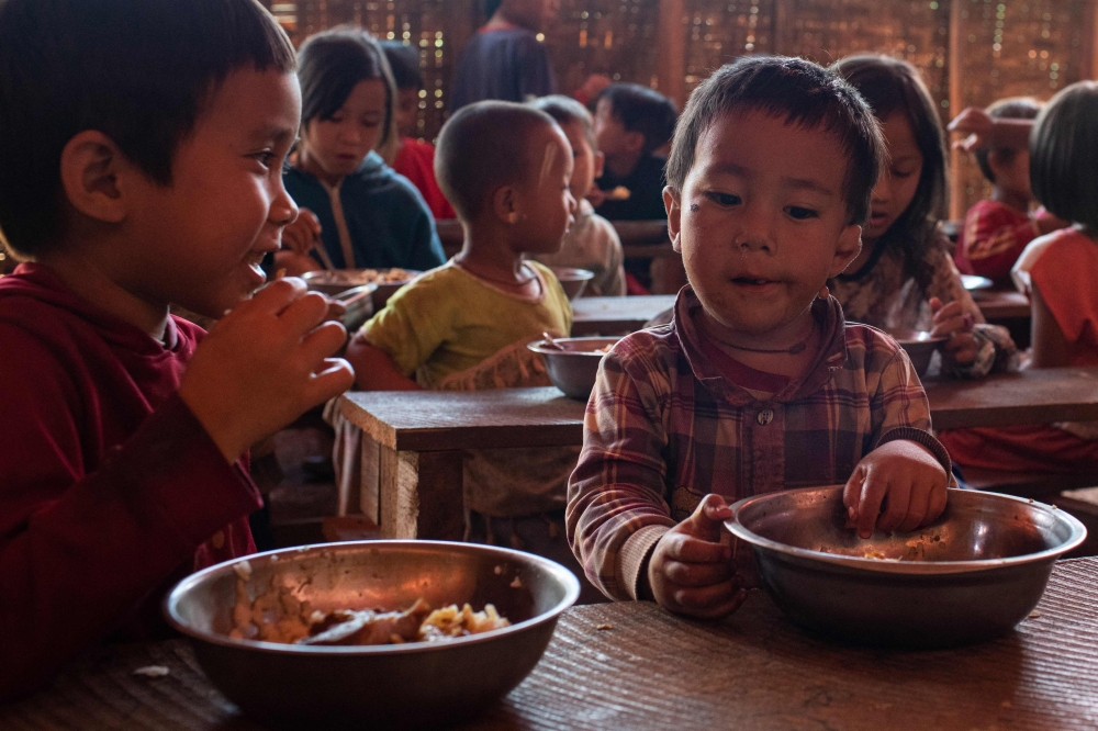 This photo taken on October 22, 2023 shows children at a camp for internally displaced people (IDPs) in the Demoso township in Myanmar’s Kayah state. — AFP pic