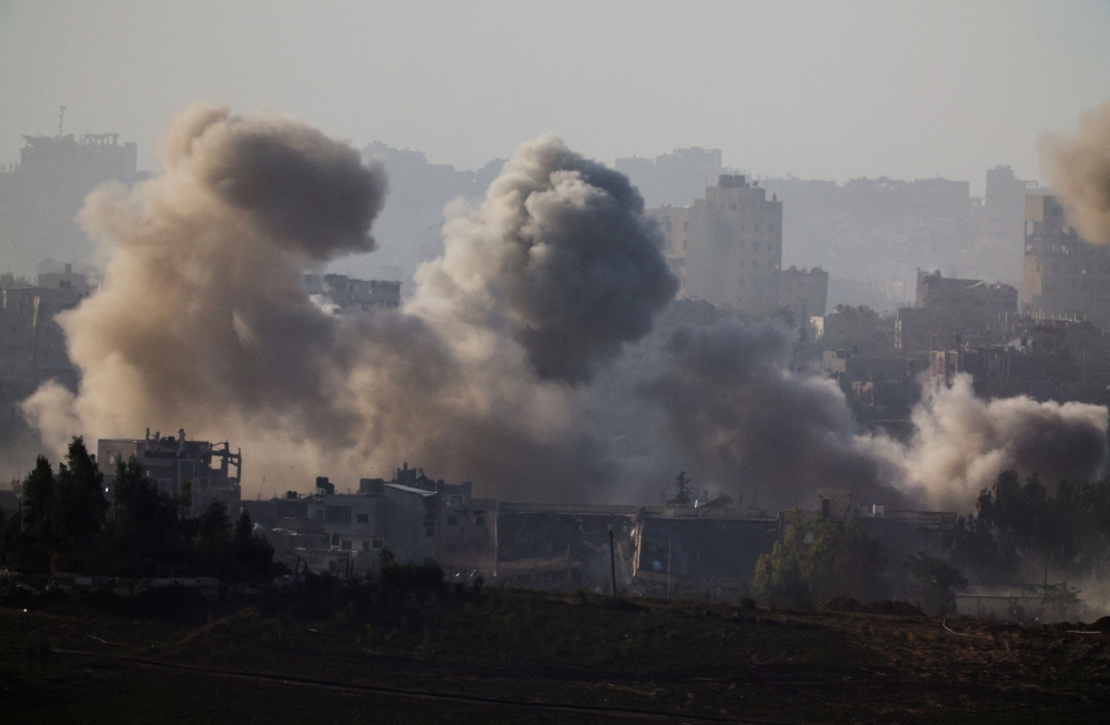 Smoke rises after Israeli air strikes in north Gaza, as seen from southern Israel, amid the ongoing conflict between Israel and the Palestinian group Hamas, November 23, 2023. — Reuters pic