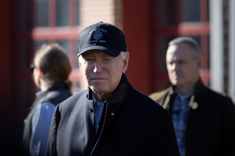 US President Joe Biden answers a question from a journalist outside the Nantucket Fire Department in Nantucket, Massachusetts November 23, 2023. — Reuters pic