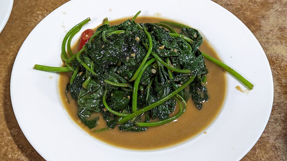 Sweet potato leaves stir-fried with fermented bean curd.
