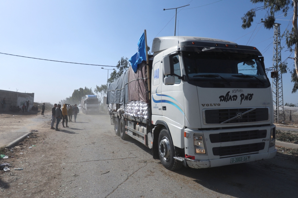 UN trucks carrying humanitarian aid heads towards north Gaza during a temporary truce between Israel and Hamas, near Gaza City November 24, 2023. — Reuters pic