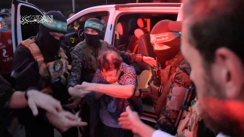 Mixed emotions as first group of Israeli hostages return from Gaza ...