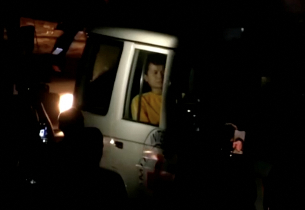 A vehicle believed to be carrying hostages abducted by Hamas during the October 7 attack on Israel, arrives at the Rafah border on November 24, 2023. ― Reuters TV via Reuters 