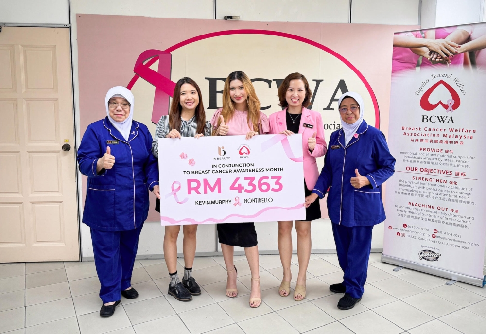 (From left) Datin Zainab, Chan, Phoebe, Lio and Salimah at the cheque presentation at BCWA. — Picture courtesy of R Beaute