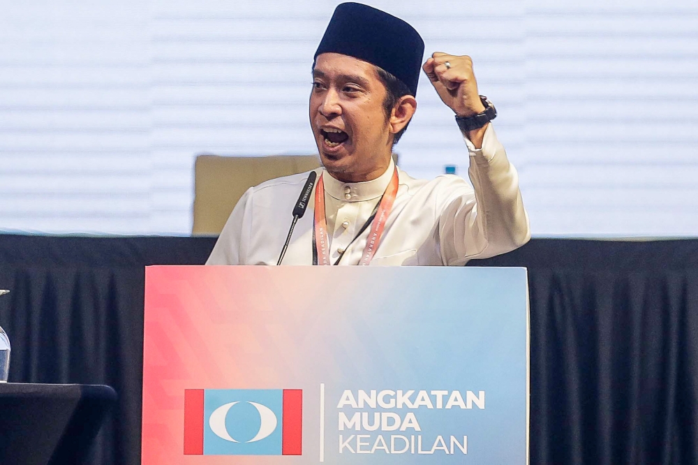 PKR Youth chief Adam Adli delivers his policy speech during the opening of PKR Youth Wing Congress here at Putrajaya International Convention Centre November 25, 2023. — Picture by Sayuti Zainudin 