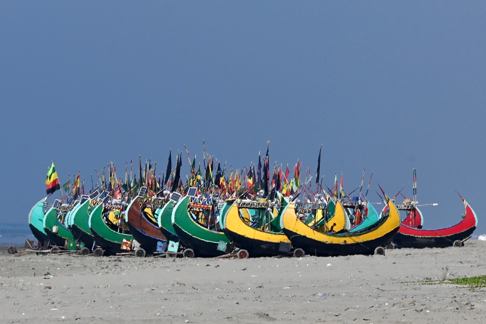 Fishing boats are seen along a beach in Teknaf on November 24, 2023. — AFP pic