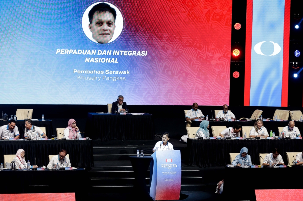 Sarawak PKR Representative Khusyairy Pangkas delivers his speech during the PKR National Congress at Putrajaya International Convention Centre. —Picture by Sayuti Zainudin