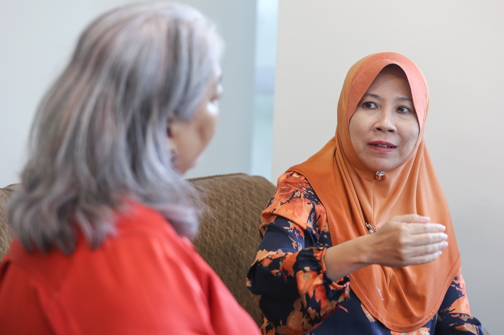 Yayasan Sime Darby chief executive officer Yatela Zainal Abidin talk about the importance of having corporate bodies involved in child protection initiatives. — Picture by Yusof Mat ISa 