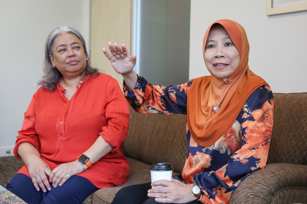 Yayasan Sime Darby chief executive officer Yatela Zainal Abidin and Yayasan Chow Kit founder Datuk Hartini Zainudin have jointly been at the forefront of child protection efforts for over a decade. — Picture by Yusof Mat Isa 