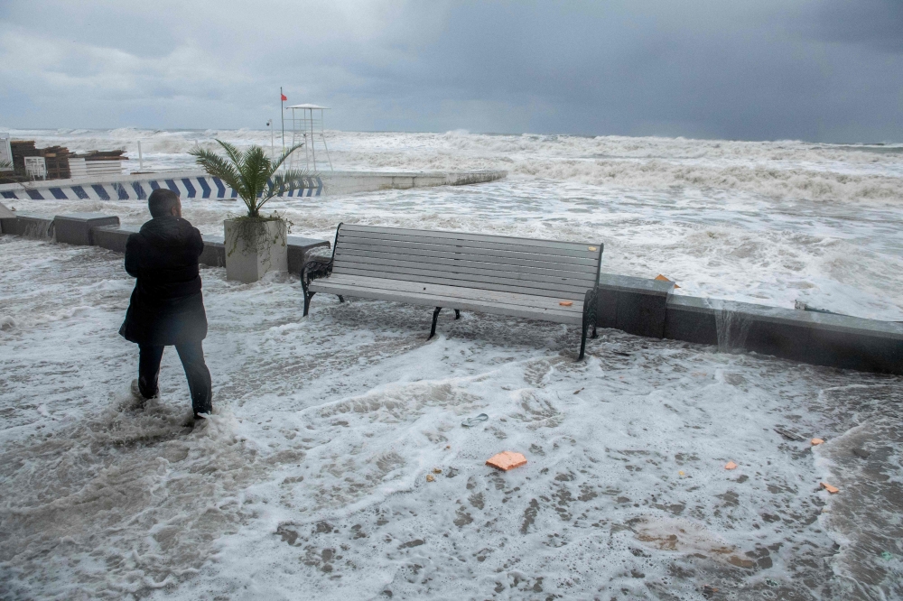 Waves crash against a seafront in the Black Sea resort city of Sochi during a storm on November 27, 2023. — AFP pic