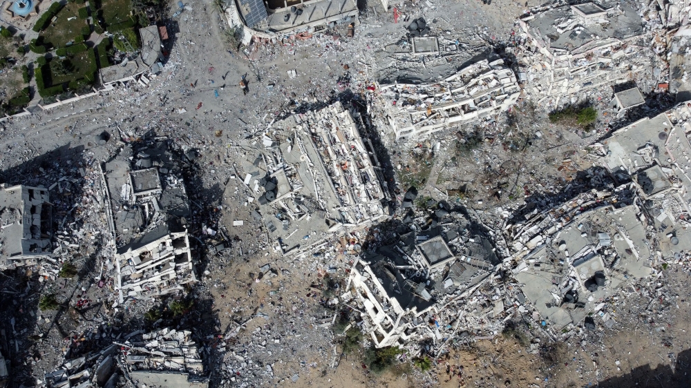 Residential buildings, destroyed in Israeli strikes, lie in ruin. — Reuters pic