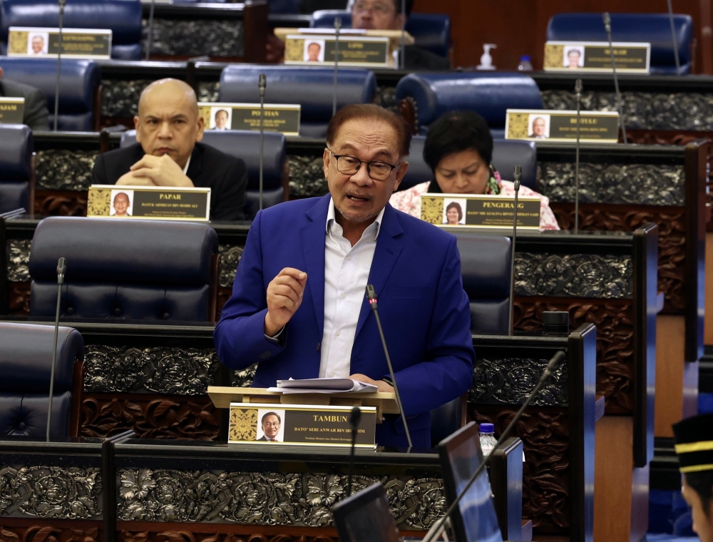 Prime Minister Datuk Seri Anwar Ibrahim speaks during the Minister's Question Time in the Dewan Rakyat, November 28, 2023. ― Bernama pic