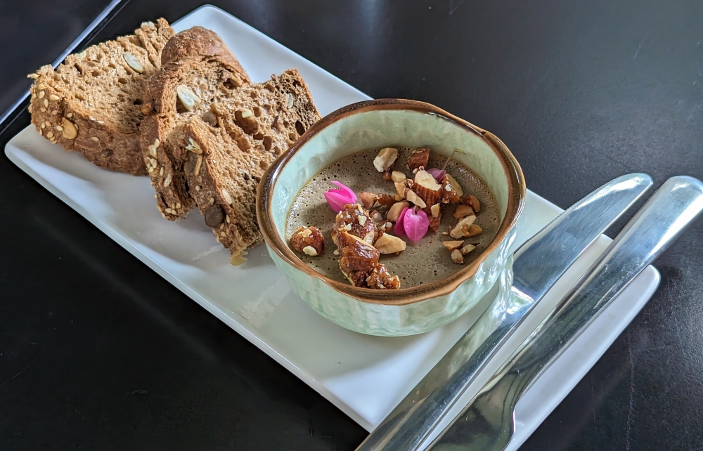 The Signature Pâté comes topped with candied nuts.