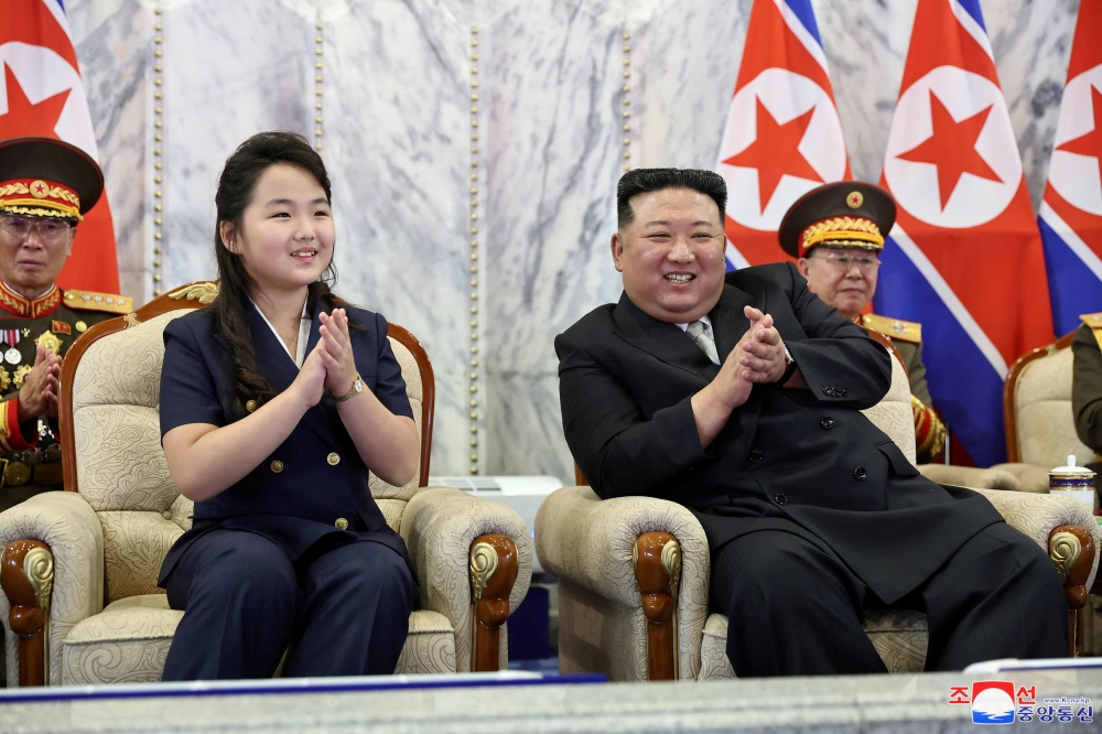 Kim Yo-jong (left), the powerful sister of North Korean leader Kim Jong-un (right) and a senior official, said the United States showed ‘extreme double standards’ at this week’s meeting of the UN Security Council over North Korea’s recent launch of its first spy satellite. — File picture courtesy of KCNA via Reuters