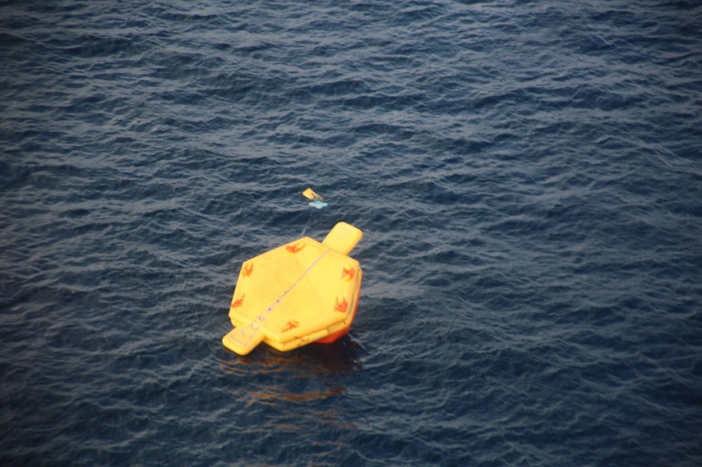 A looking-like life raft floating object believed to belong to the U.S. military aircraft MV-22 Osprey that crashed into the sea is seen off Yakushima Island, Kagoshima prefecture, western Japan November 29, 2023. — Handout by Japan Coast Guard via Reuters
