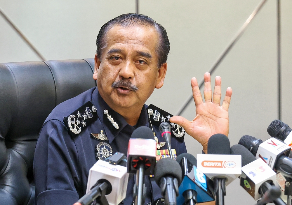 The Inspector-General of Police (IGP), Tan Sri Razarudin Husain press conference on  crippled a transnational cybercrime syndicate that specialised in offering phishing as-a-service operations at Bukit Aman ,KL. Nov 8 , 2023 . Picture by Choo Choy May .