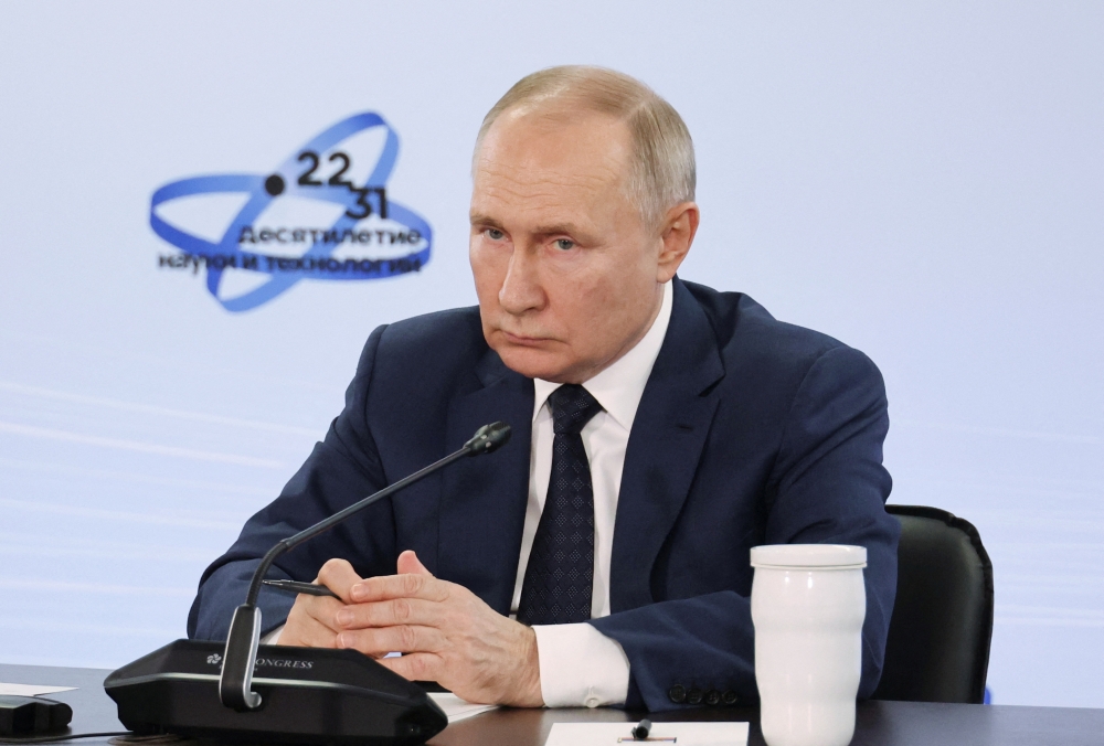 President Vladimir Putin will hold his annual press conference and field questions from the public on December 14, the Kremlin said today, stoking speculation he will use the event to announce he is seeking another six years in power. — Reuters pic