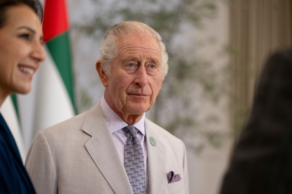 Britain's King Charles speaks with a guest prior to a meeting with President of the United Arab Emirates Sheikh Mohamed bin Zayed Al Nahyan during the United Nations Climate Change Conference (COP28), at Dubai Exhibition Centre, United Arab Emirates, November 30, 2023. — Abdulla Al Neyadi/UAE Presidential Court/Handout via Reuters pic