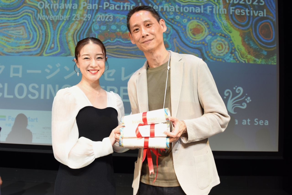 Ong (right) at the Cinema at Sea Okinawa Pan-Pacific International Film Festival — Picture courtesy of Jin Ong