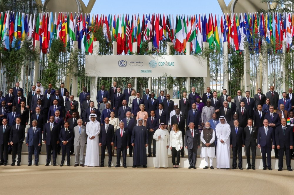 Participating world leaders and delegates pose for a family photo during the COP28 United Nations climate summit in Dubai December 1, 2023. World leaders take centre stage at UN climate talks in Dubai on December 1, under pressure to step up efforts to limit global warming as the Israel-Hamas conflict casts a shadow over the summit. — AFP pic