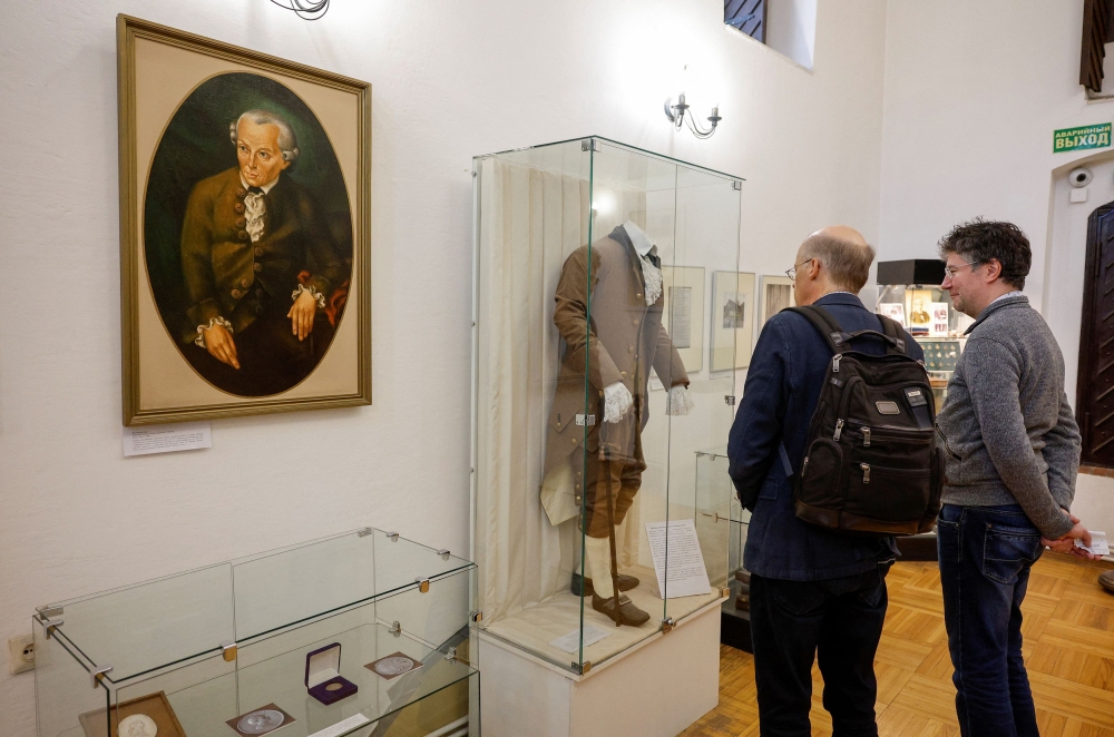 People visit the museum of German philosopher Immanuel Kant at the Cathedral, also known as the Koenigsberg Cathedral, in Kaliningrad November 26, 2023. — Reuters pic