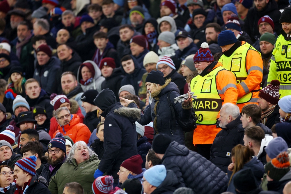 Legia Warsaw fans are removed from a home supporters stand during the match against Aston Villa at Villa Park in Birmingham November 30, 2023. — Reuters pic