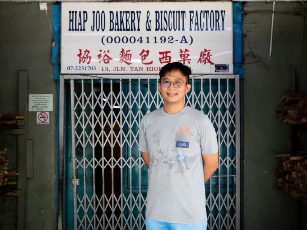 Third-generation owner of Hiap Joo Bakery, Lim Toh Huei, whose business is largely patronised by Singaporeans on weekends, said Johor Baru is “definitely impacted” by Singaporeans pouring into the city. — TODAY pic