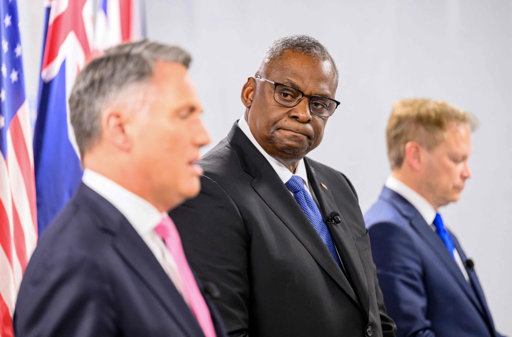US Defence Secretary Lloyd Austin (centre) participates in the AUKUS Defence Ministerial Meeting with Australian Defence Minister Richard Marles (left) and British Defence Secretary Grant Shapps, in Mountain View, California December 1, 2023. — AFP pic